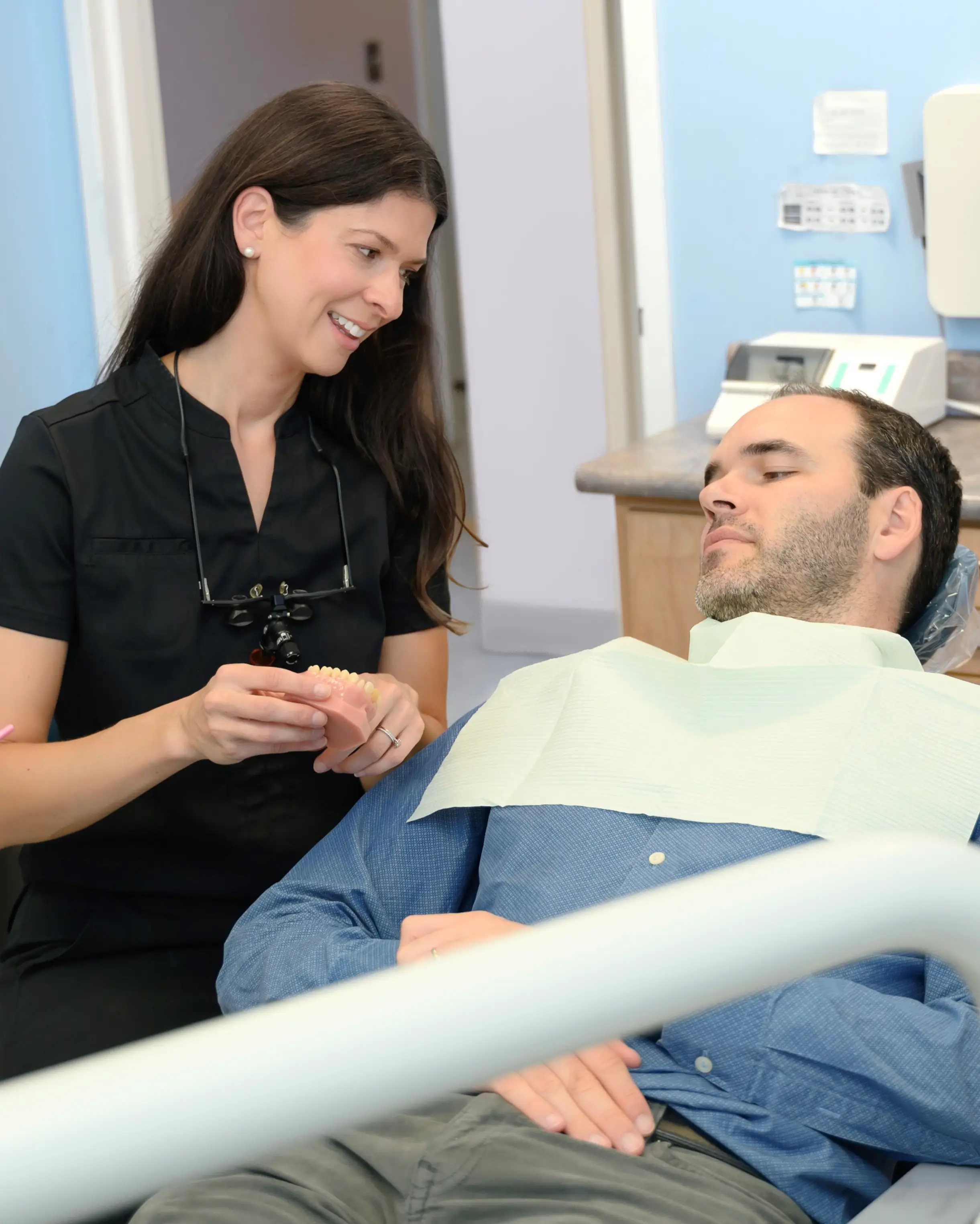 Dentist with patient